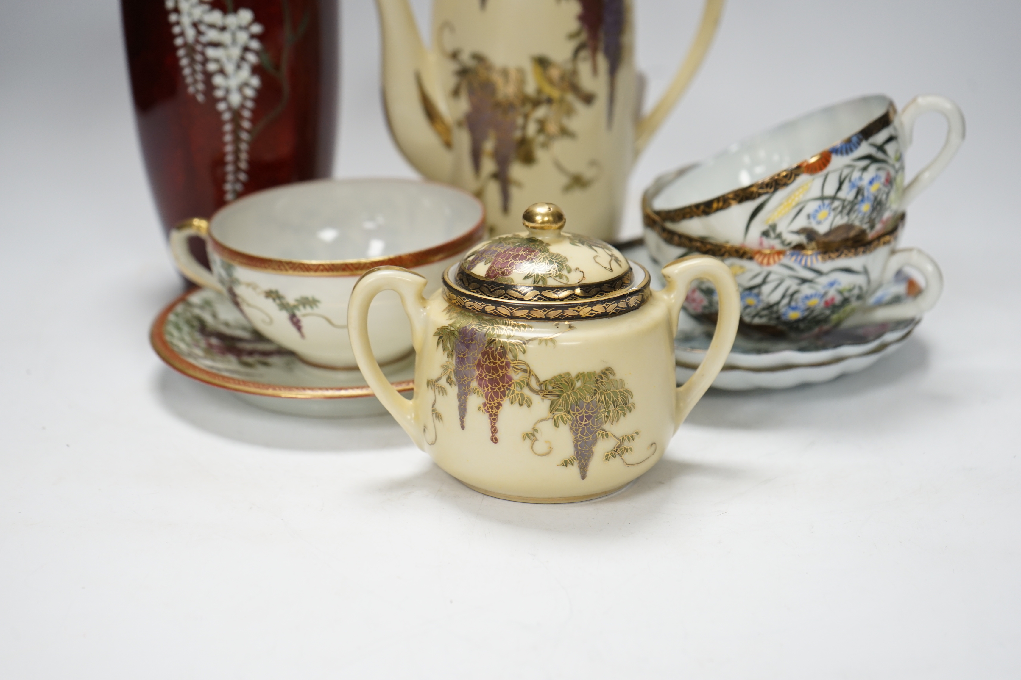 A Japanese cloisonné enamel vase, a pair of enamelled buttons and assorted Japanese ceramics including satsuma and kutani